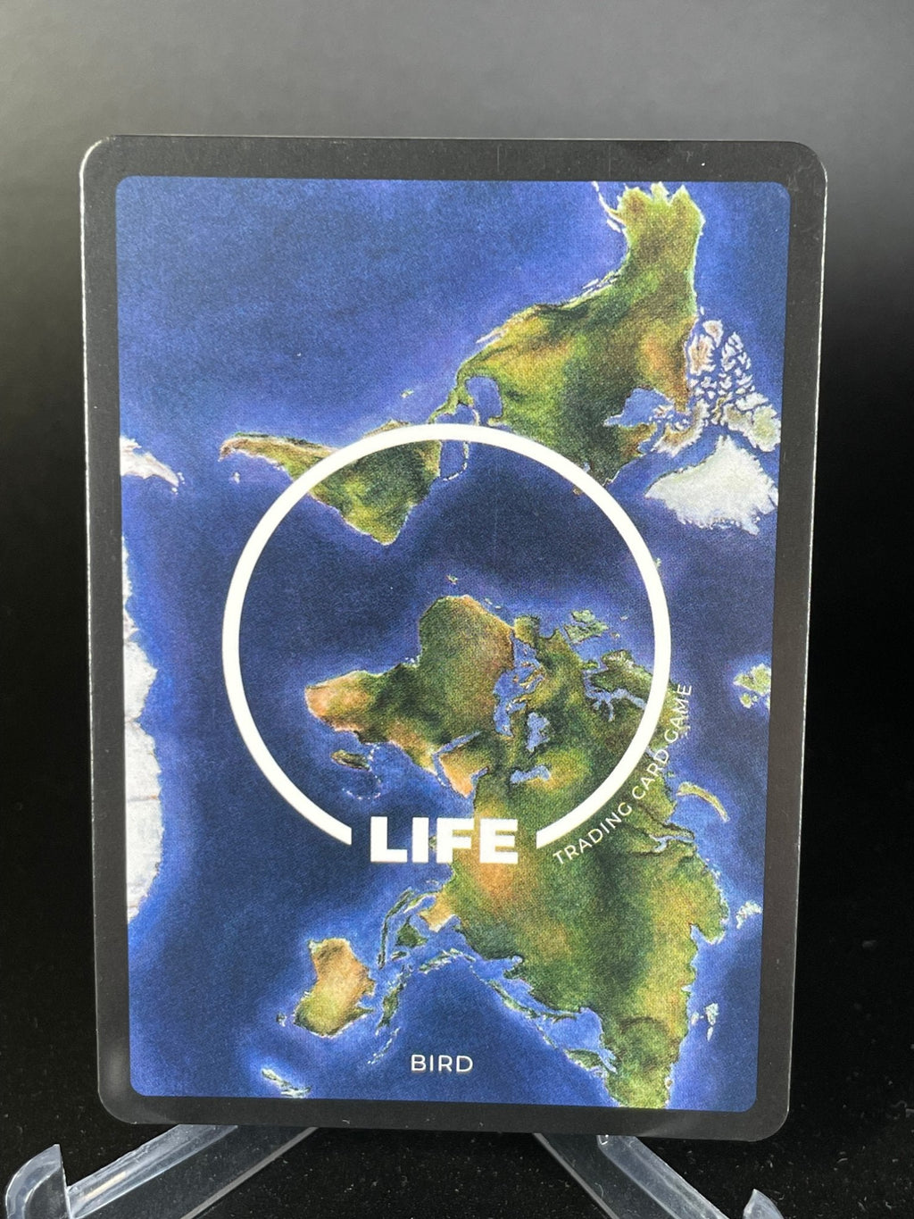 Galapagos Penguin — Birds Holo #22/130 | LIFE TCG | 1st Edition (Pop: 2,000) (back)